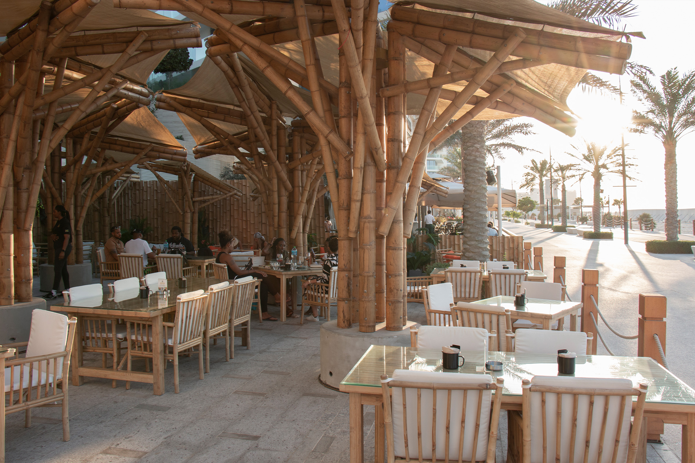 coral inspired bamboo umbrellas at ting irie restaurant abu dhabi by nomadic resorts